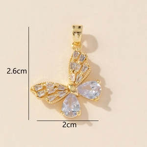 Detailed dimension view of gold butterfly pendant with zircon insets, size 2.6cm by 2cm