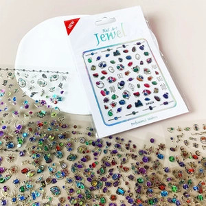 Macro detail of aurora jewel nail art stickers DP624 with colorful gemstone patterns