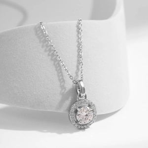 Elegant S925 sterling silver necklace with a one-carat round moissanite halo pendant