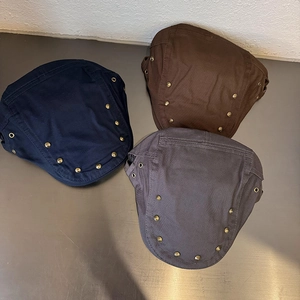 Coppole vintage in cotone con rivetti dorati in blu navy, marrone e grigio fumo