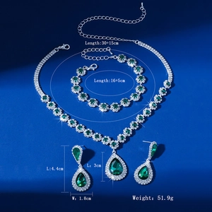 Detail showing green rhinestone jewelry set dimensions for necklace, bracelet and earrings