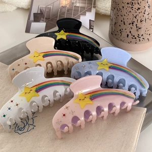 Rainbow star hair clips set with rhinestones in black, cream, blue, white and pink