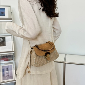 Retro straw crossbody bag with bamboo handle and floral embroidery for women