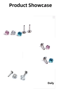 Detail view of steel labret studs with pink, clear, and blue zircon gemstones