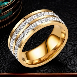 Macro shot of gold stainless steel ring featuring double row square-cut zircon stones