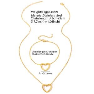 Gold stainless steel jewelry set with hollow heart pendant necklace and matching bracelet