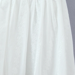 White square neck dress with floral embroidery and button-up waist detail