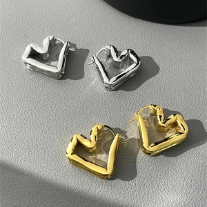 Irregular textured heart hoop earrings in gold and silver finish with S925 silver posts