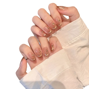 Mocha cat-eye press-on nails with french gradient and glitter diamond accents