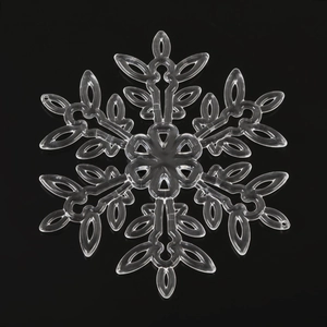 Detailed top view of a transparent snowflake ornament with intricate cutout design for decor