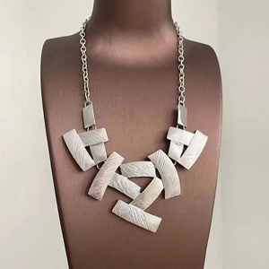 Brushed silver geometric stacked rectangle pendant necklace for women on neck model