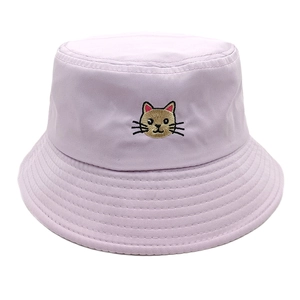 Close-up of cat embroidery detail on light purple cotton bucket hat with twill texture