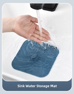 Blue square silicone sink stopper blocking water in a bathroom washbasin for water storage