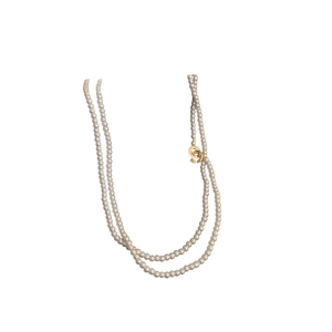 Elegant double-layer faux pearl necklace with a vintage gold-toned interlocking buckle