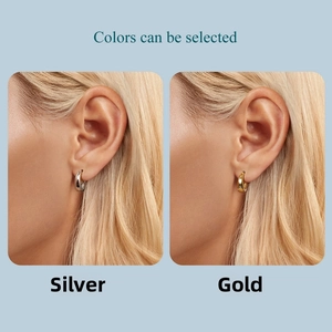 Close-up of minimalist s925 silver hoop earrings available in gold and silver finish