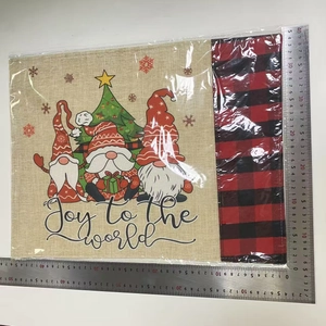Christmas gnome placemat with Joy to the world text and red buffalo plaid edges