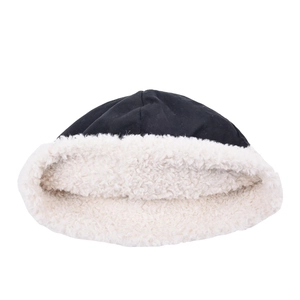 Minimalist black lamb wool bucket hat for women with warm off-white fleece lining