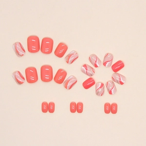 Glossy orange coral fake nails with wavy patterns and gold glitter accents 24pcs set