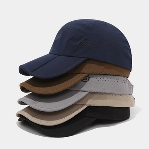 Vertical stack of five color-folded quick-dry outdoor baseball hats with breathable laser holes