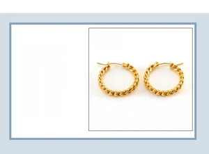 Detailed view of twisted rope hoop earrings in 18K gold plated stainless steel