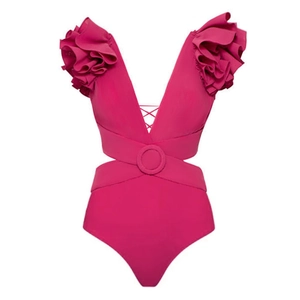 Close-up of deep V-neck swimsuit with 3D floral ruffles and ring belt in rose pink