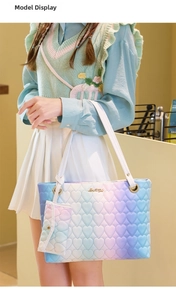 Close-up of heart-quilted gradient tote bag set with heart-shaped coin purse