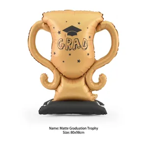 Detailed view of matte gold trophy balloon measuring 80x98cm for graduation party