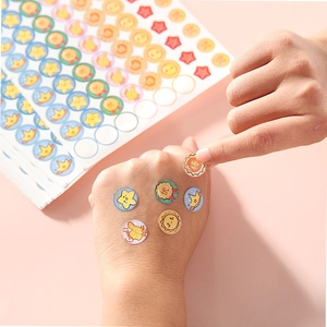 Colorful reward stickers for kids featuring stars and crowns on high-quality adhesive paper