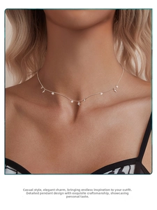 Detail of s925 silver necklace featuring star pendants and sparkling zircon crystals