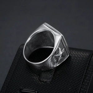 Vintage silver stainless steel ring for men featuring an embossed star and anchor design