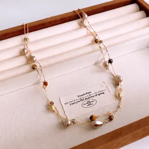 Baroque pearl necklace with tiger eye beads and gold chain for autumn winter styling