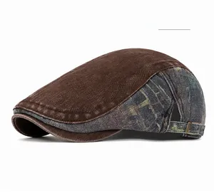 Detailed side view of vintage patchwork newsboy cap with metal buckle and washed denim