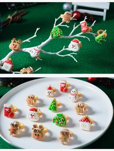 Close-up of Christmas cookie rings featuring Santa and snowman shapes for DIY baking
