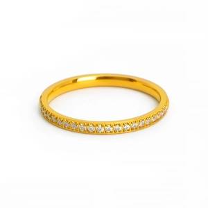 Close-up of gold-plated titanium steel ring with sparkling pave-set micro zirconia stones
