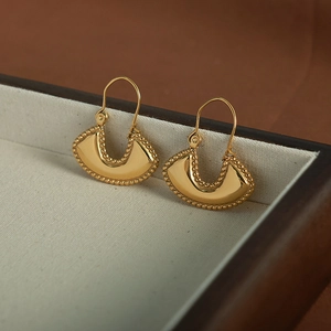 Elegant gold fan-shaped hoop earrings with beaded edges in French vintage style