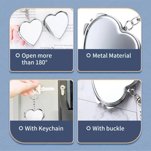 Foldable heart-shaped metal mirror keychain with 180-degree opening and silver finish