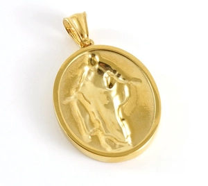 Detailed back view of a 18k gold oval relief pendant showing negative space texture