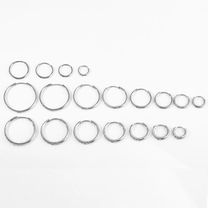 Multiple sizes of stainless steel hoop earrings with hinged closure and silver finish