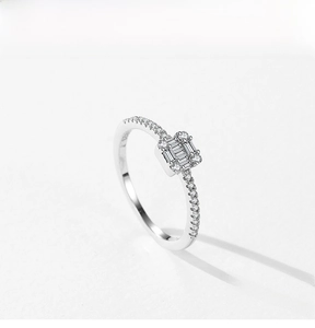 Macro shot of S925 sterling silver ring with square diamond pavé setting and silver finish