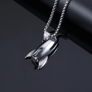 Polished silver punk rocket pendant necklace for men with a sleek beaded chain