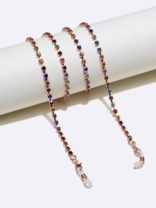 Detail of colorful rhinestone non-slip eyewear chain with gold metal links and silicone loops