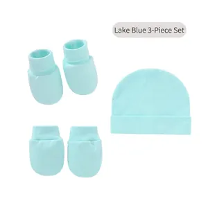 Detail view of lake blue baby 3-piece set with knitted hat, mittens and booties