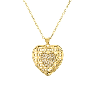 Detailed view of golden heart pendant with hollow texture and sparkling zircon inlay