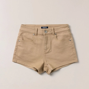 Detail of high-quality khaki denim shorts showing twill texture and branded metal button