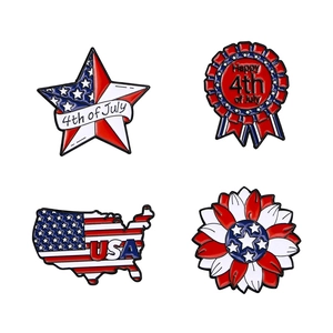 Set of four USA flag enamel pins for Independence Day with red, white, and blue designs