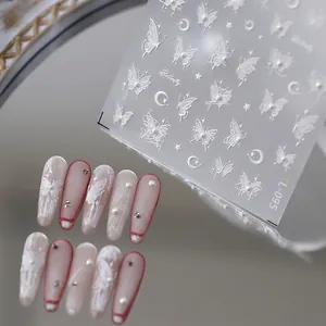 3D embossed white butterfly nail stickers with moon and stars patterns on gradient base