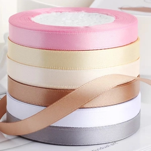 Colorful 1cm satin ribbons for gift wrapping and hair styling in various pastel tones