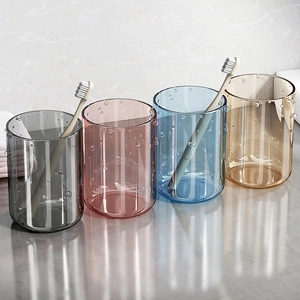 Minimalist transparent mouthwash cups with bubble texture in four elegant colors