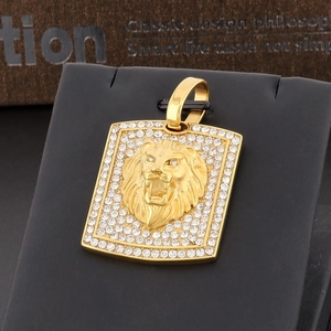 Detailed view of hip hop lion head pendant with sparkling rhinestones and gold plating
