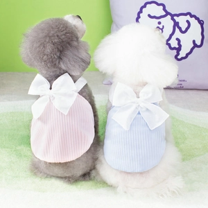 Cute pink and blue knitted puppy dog vests with large white bows for spring and summer